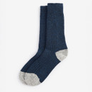 A pair of dark blue woollen socks with a ribbed texture, featuring light gray heels and toes. The socks are neatly aligned on a plain white background.