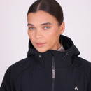 A close up front view of a woman wearing a Shires Aubrion softshell react coat