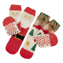 Two pairs of Totes children’s slipper socks in festive designs – one featuring Santa Claus and the other a reindeer with 3D antlers, both with red slip-resistant soles.
