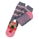 Pair of Totes Toasties novelty slipper socks with pink and navy stripes, bear face in a red scarf and hat, and pink slip-resistant grip on the sole.