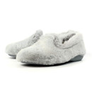 Angled side view of a pair of light grey fluffy slippers featuring a soft faux fur finish and grey rubber soles, designed for warmth and comfort indoors. Angled side view of a pair of light grey fluffy slippers featuring a soft faux fur finish and grey rubber soles, designed for warmth and comfort indoors.
