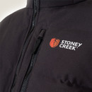 Close-up of the Stoney Creek Men’s Thermotough Jacket chest area, showing the logo print, water-resistant zip, and ripstop fabric texture in black.