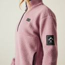 Detailed side view of lilac fleece sleeve with DARE2B mountain patch on upper arm.