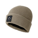 A side view of a stone coloured beanie hat with a black brand logo on the front of the roll cuff.