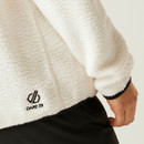 Close-up of the lower back of the fleece showing embroidered Dare2b logo in black against the egret fabric.