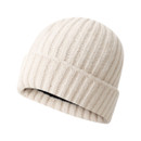 A side view of a light grey beanie hat with a roll cuff.