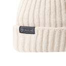 A close up view of the small black Dare 2b branding at the front of the beanie hat.
