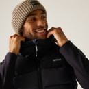 Close-up showing Regatta logo and hood drawstring detail on Aldthorn padded black vest – designed for warmth and utility.
