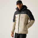 Studio shot of man wearing ALDTHORN jacket with hands in pockets, looking serious.