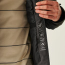 Close-up of a person holding open a black jacket, exposing the inner lining. Icons display features: waterproof, breathable, and eco-friendly. Casual and informative tone.