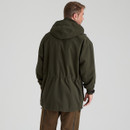 A back view of a man wearing a forest green Ridgeline Torrent jacket