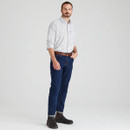 Men’s white check country shirt styled with dark jeans and boots, displayed in a studio setting.