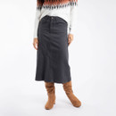 A person wearing a midi length black, denim skirt with tall brown boots.