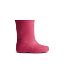 A side view of a bright pink mid-height children's Hunter wellington boot. A side view of a bright pink mid-height children's Hunter wellington boot.