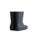 The back of a pair of navy children's Hunter wellington boots.