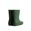 The back of a pair of dark green children's Hunter wellington boots.