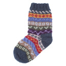 A colourful knit sock featuring intricate, zigzag and stripe patterns in shades of blue, red, yellow, and more, conveying a warm, cosy feel.