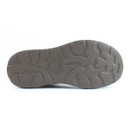 A view of the sole on a green Heavenly Feet ankle boot on a white background