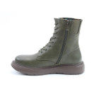 A side view of a green Heavenly Feet ankle boot on a white background