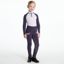 Smiling child in a pale lilac and deep purple long-sleeved zip-up base layer with matching deep purple LeMieux riding tights featuring full seat silicone grip and pocket accents, paired with black ankle boots.