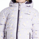 Close-up of lilac LeMieux padded jacket fabric showing horse and lemon print pattern with embroidered logo.