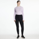 Full body view of model wearing Natalie Brushed Pull On black riding leggings with lilac long sleeve top