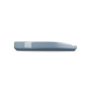 Side profile of a light blue Le Creuset stoneware spoon rest showing flat base and gently raised rim with spoon notch.