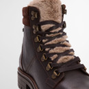 Detailed view of faux fur tongue and brass lace hooks on Barbour Bamburgh hiker boots