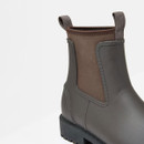 Close-up of side panel and pull tab on chocolate brown Joules Oakfield short neoprene Wellington boot.