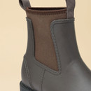 Close-up of the elastic side gusset and pull tab on a Joules women's brown Chelsea wellington boot, showcasing the easy pull-on design.