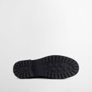 Outsole view of Barbour Mallow Chelsea Welly boot in charcoal black with heavy-duty tread for grip and durability.