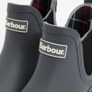 Detailed view of Barbour Mallow Chelsea Welly boots in charcoal black showing tartan lining and elastic side panel.