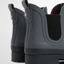 Close-up of heel and side panel on Barbour Mallow Chelsea Welly boots in charcoal black with stretch gusset.