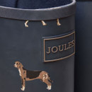 Close-up of the Joules logo patch and dog print design at the top of a navy Wellington boot.