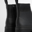 Barbour Layla ankle welly boots black – close-up of heel and side zip with embossed Barbour branding.