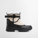 Profile view of Barbour Braybourn beige and black waterproof boots with durable rubber lower and textile upper.