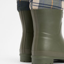 Detail of Barbour olive green Mowbray Mid Welly boots showing tartan collar and reinforced heel.