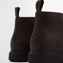 Close-up of Barbour Meays Chukka Boot heel detail in dark brown leather and textile