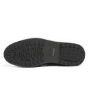 Close-up of treaded sole of Barbour Hale Chelsea Boot in black featuring embossed Barbour logo