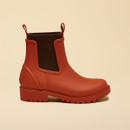 Side profile of Joules Oakfield orange Chelsea wellington boot with dark brown elastic gusset.