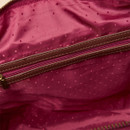Close-up of the berry red tote bag’s interior with polka dot lining and zip pocket.