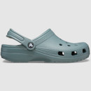 Light blue Crocs clog-style shoe with ventilation holes and adjustable heel strap, set against a plain background. The design conveys comfort and practicality.