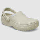 Beige clog-style shoe with a textured sole and an adjustable strap at the back. The texture and design convey a casual and functional tone.