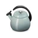 A side view of a light blue kettle with a black handle.