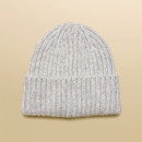 Back view of a women’s grey ribbed knit beanie hat with fold-over hem.