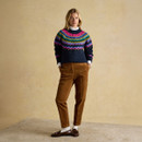 Full outfit with Charlie Fairisle navy jumper styled with brown trousers and loafers.