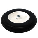 A view of a puncture-proof wheelbarrow wheel on a white background