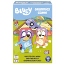 A box of "Bluey Grannies Game" shows two cartoon dog characters wearing costumes, excitedly dancing in a backyard. Text: "Race to call Nana!" Fun, playful tone.