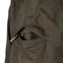 Close-up of the olive green pullover jacket showing a concealed zipped pocket beneath the large front flap.