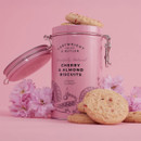 Cartwright & Butler Cherry & Almond Biscuits 200g in a pastel pink clip-top tin with buttery biscuits and floral accents.